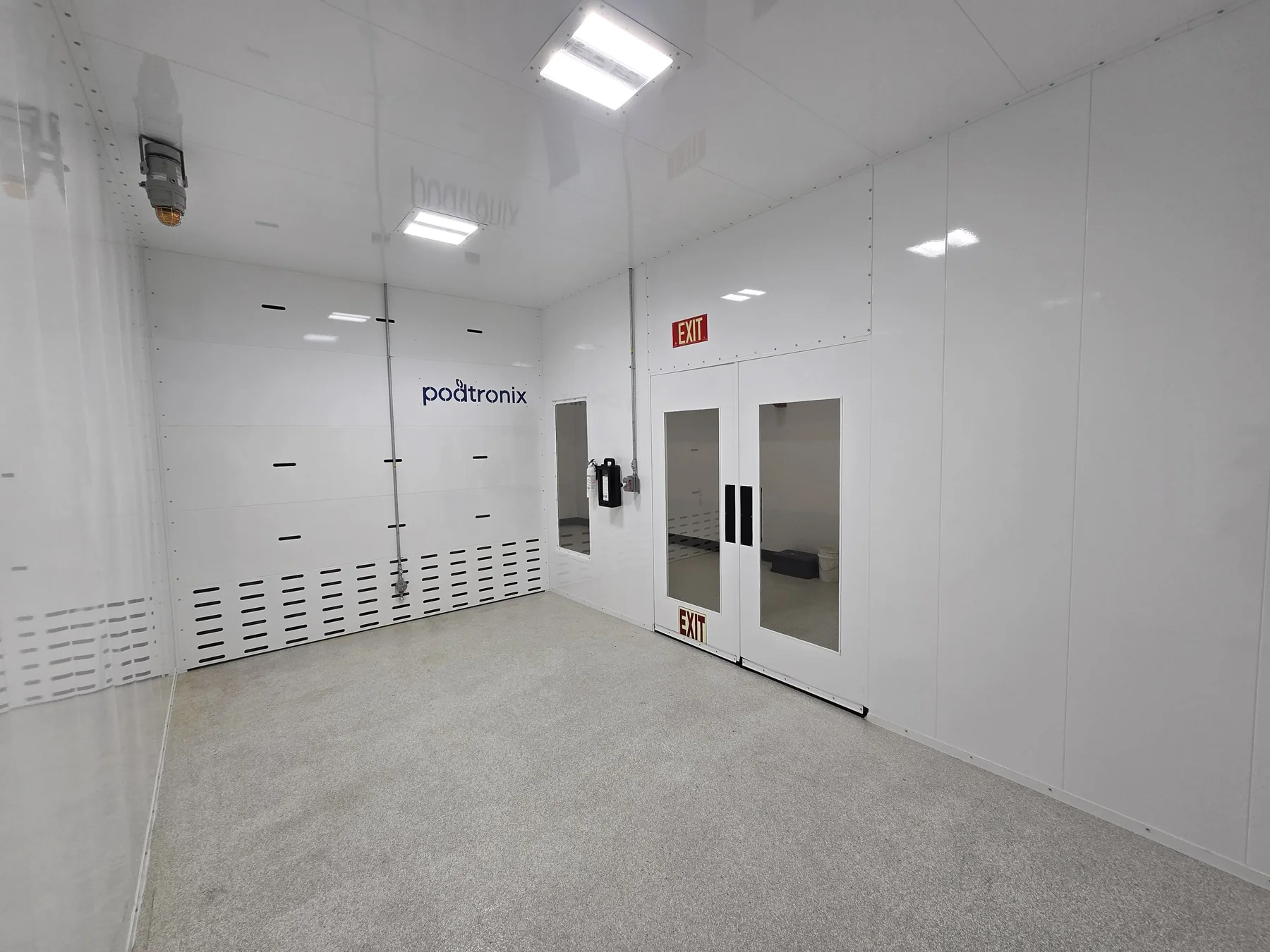 Podtronix finished room with flush interior panels, ceiling lights and low wall ventilation