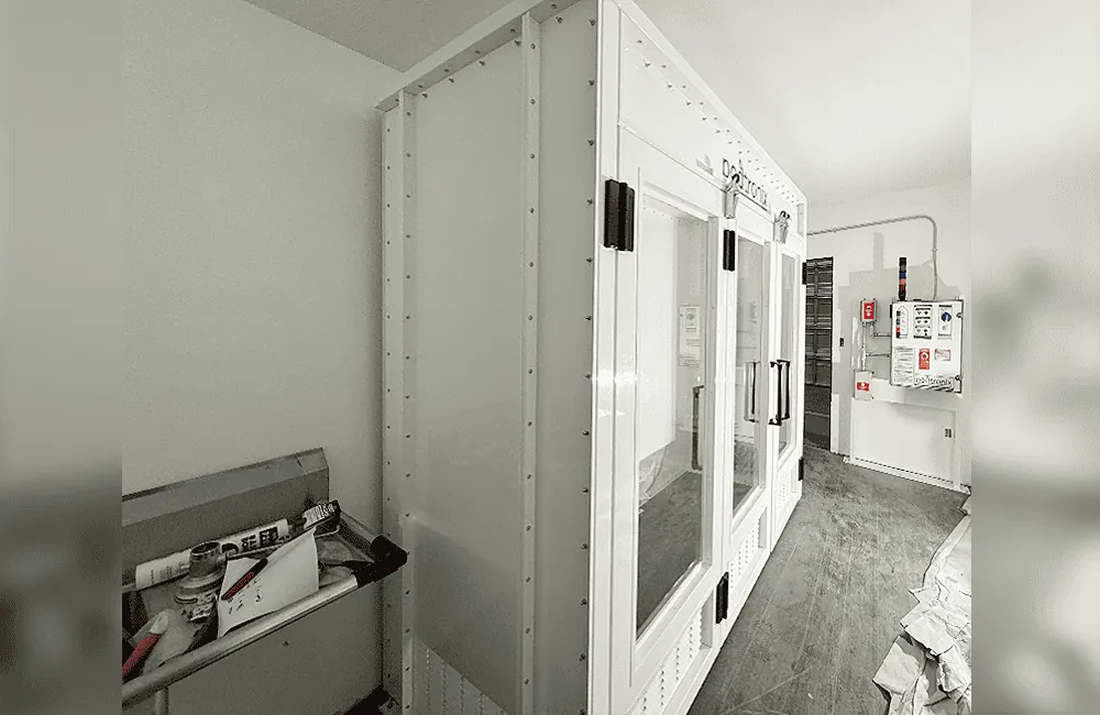 Installation view – side profile with Podtronix control panel mounted to adjacent wall